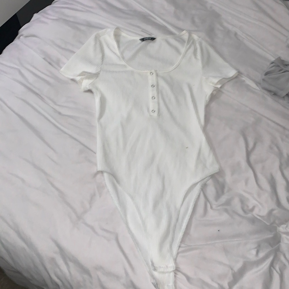 White bodysuit with buttons
